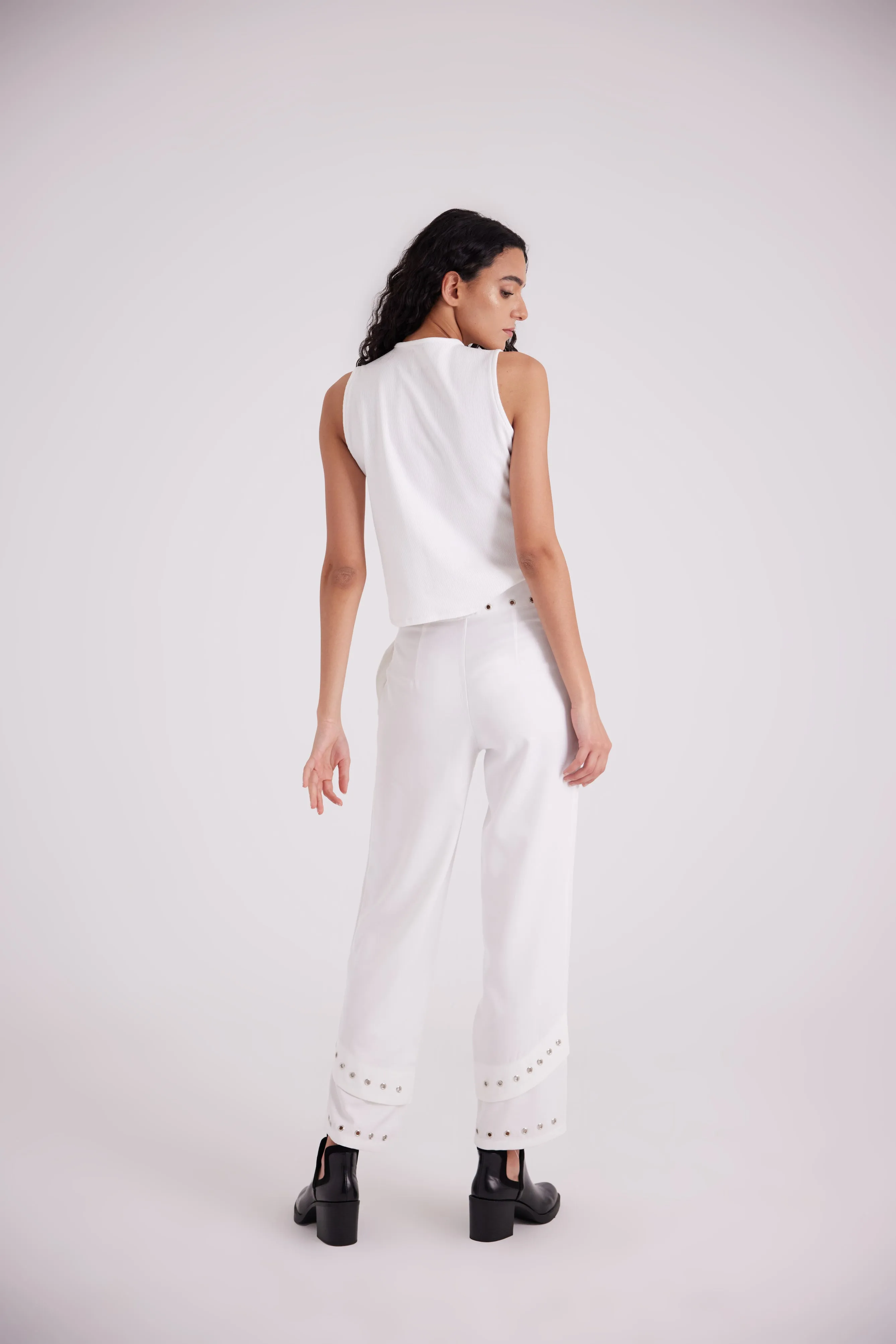 White asymmetric side buttoned cut top
